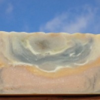 Daydreamer Soap with black oxide, Moroccan red clay, French pink clay, and scented with cranberry fig.